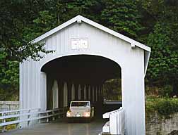Rover crossing a covered bridge